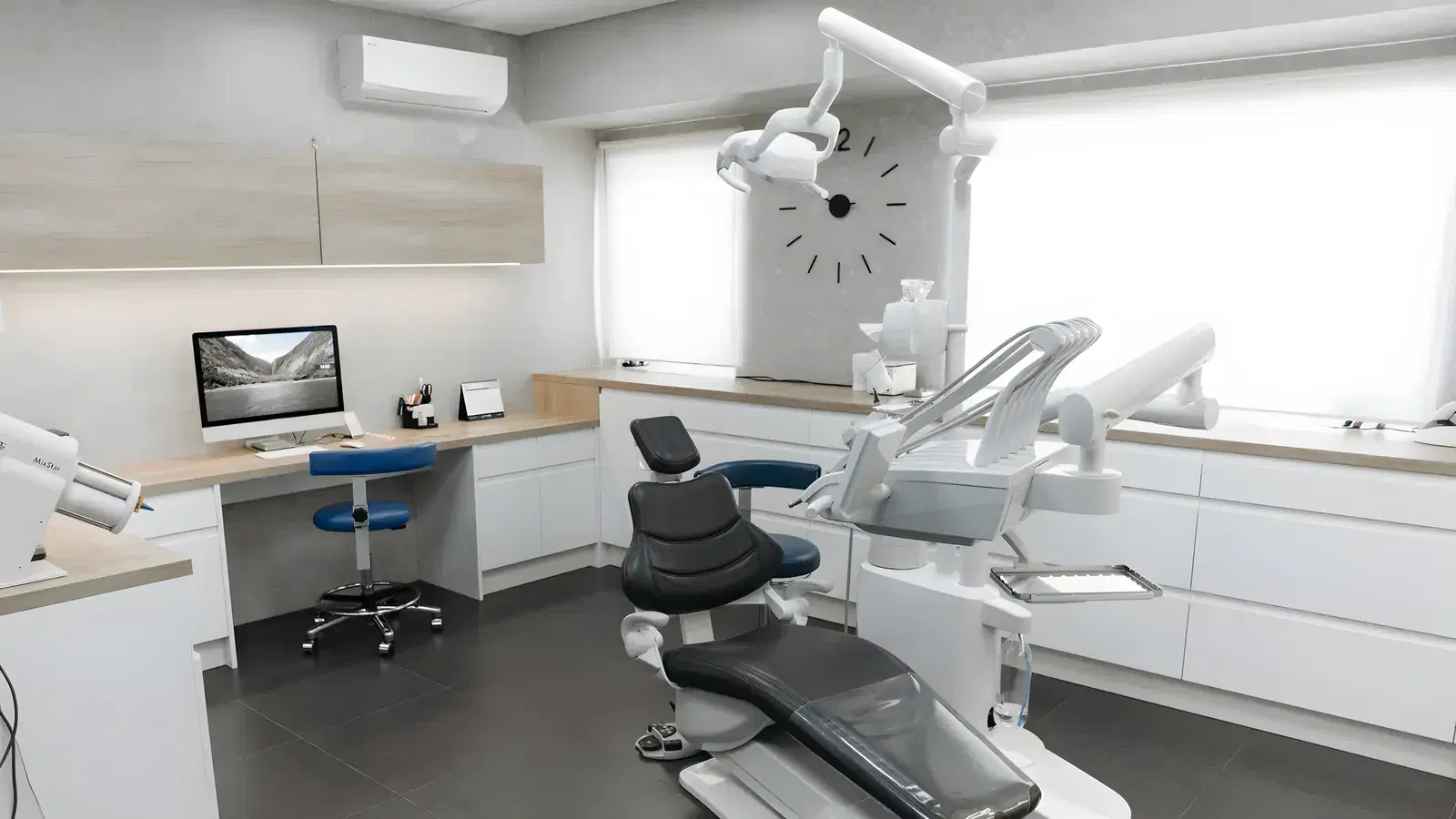 A calm, uncluttered dental surgery with daylight through the window and an empty chair waiting